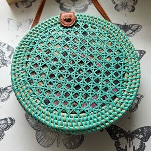 Round Bali crossbody bag handwoven Rattan Teal brown floral lining, faux leather